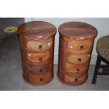 PAIR OF CIRCULAR WALNUT FOUR DRAWER BEDSIDE CHESTS OF DRAWERS