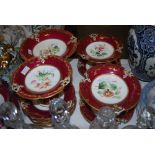 VICTORIAN RED AND GILT PATTERNED FRUIT SET WITH CENTRAL PANELS OF MIXED FOLIAGE