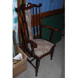 STAINED MAHOGANY SPAR BACK KITCHEN CHAIR WITH UPHOLSTERED SEAT AND BACK SUPPORTED ON TURNED LEGS