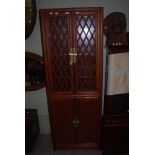 CHINESE CHERRYWOOD SIDE CABINET, THE UPPER SECTION WITH TWO LATTICE GLAZED DOORS, BOTTOM SECTION