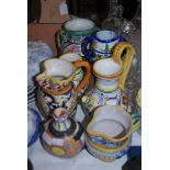 ASSORTED ITALIAN POTTERY INCLUDING EWERS, VASES, JAR AND COVER, JUGS, ETC.
