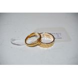 A 9CT GOLD RING AND A 22CT GOLD WEDDING BAND