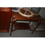 A WALNUT TWO TIER RECTANGULAR SHAPED SIDE TABLE