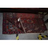 TWO EASTERN HAND WOVEN RUGS