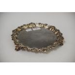 ANTIQUE LONDON SILVER SALVER WITH ENGRAVED FOLIATE DETAIL, RAISED ON THREE SCROLL AND ANTHEMION CAST