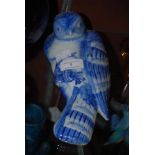 DECORATIVE BLUE AND WHITE PORCELAIN WALL POCKET IN THE FORM OF A BIRD OF PREY STANDING ON A BRANCH