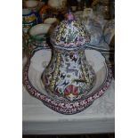 PORTUGUESE CERAMIC FONT AND BASIN DECORATED WITH MIXED FOLIAGE AND ANIMALS