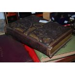 ONE VICTORIAN LEATHER BOUND PHOTO ALBUM WITH FAMILY PHOTOS