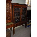 LATE 19TH/EARLY 20TH CENTURY MAHOGANY BOOKCASE WITH TWO GLAZED ASTRAGAL DOORS, ON SQUARE TAPERED