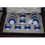 SPODE COPELANDS CASED SIX PIECE COFFEE SET DECORATED WITH POWDER BLUE GROUNDS AND RICHLY GILDED