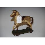 LATE 19TH/EARLY 20TH CENTURY CARVED AND PAINTED PINE CHILD'S TOY HORSE FIGURE