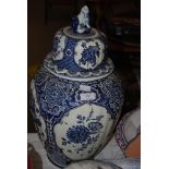 DELFT BLUE AND WHITE OVOID SHAPED JAR AND COVER DECORATED WITH MIXED FOLIAGE