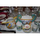 ASSORTED ITALIAN POTTERY INCLUDING URN SHAPED VASES, JUGS, TANKARDS, CANDLESTICKS, SMALL EWER, OVOID