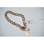 A 9CT GOLD BRACELET WITH 9CT GOLD HEART SHAPED LOCKET, 33.2 GRAMS
