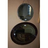 CIRCULAR BEVELLED ART DECO PERIOD WALL MIRROR TOGETHER WITH A OVAL BEVELLED WALL MIRROR IN SIMULATED