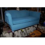 EARLY 20TH CENTURY BLUE UPHOLSTERED TWO SEAT SOFA ON SHORT CABRIOLE SUPPORTS