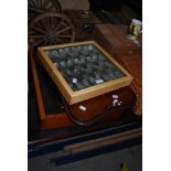 CLEAR AND FROSTED GLASS CHESS SET IN FITTED CASE DOUBLING AS A BOARD TOGETHER WITH MAHOGANY AND