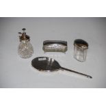 TWO GLASS DRESSING TABLE JARS WITH SILVER TOPS, TOGETHER WITH A GLASS PERFUME ATOMISER WITH SILVER