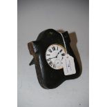 WHITE METAL CASED TRAVELLING TIMEPIECE IN GREEN LEATHER TRAVELLING CASE