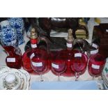 COLLECTION OF ASSORTED RUBY AND CLEAR GLASS WARE TO INCLUDE TWO DECANTERS AND STOPPERS, ASSORTED