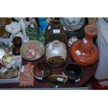 FIVE PIECES OF ASSORTED STUDIO POTTERY, TERRACOTTA BOTTLE VASE, PAINTED POTTERY FIGURE OF A BIRD,