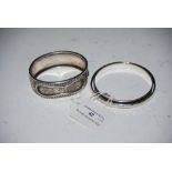 SILVER BANGLE STAMPED 925, TOGETHER WITH A WHITE METAL ENGRAVED BANGLE