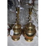 PAIR OF BRASS BARLEY TWIST CANDLESTICKS, TOGETHER WITH A PAIR OF CHINESE BRASS JARS AND COVERS