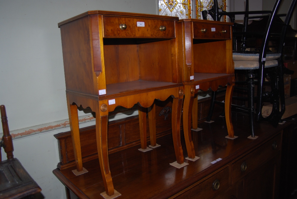 PAIR OF REPRODUCTION YEW WOOD BEDSIDE CABINETS, EACH WITH SINGLE DRAWERS AND OPEN RECESS