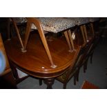 VICTORIAN MAHOGANY EXTENDING DINING TABLE ENCLOSING THREE ADDITIONAL LEAVES, THE RECTANGULAR TOP
