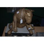 PLASTER GOLD PAINTED MODEL OF A TERRIER DOG