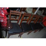 SET OF FOUR VICTORIAN BLACK LEATHERETTE UPHOLSTERED DINING CHAIRS