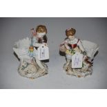 PAIR OF CONTINENTAL PORCELAIN FIGURAL FERN POTS - YOUNG GIRL CARRYING BASKET WITH DOG AND YOUNG
