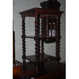LATE 19TH CENTURY STAINED OAK THREE TIER OCCASIONAL TABLE ON BARLEY TWIST SUPPORTS