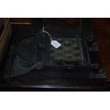 AN ARCHITECTURAL FORM BLACK PAINTED METAL LETTER BOX WITH LEADED GLASS PANEL
