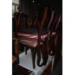 SET OF FOUR EDWARDIAN MAHOGANY DINING CHAIRS WITH STRIPED UPHOLSTERED SEATS