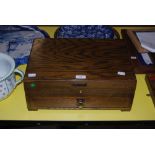 OAK CASED CANTEEN OF CUTLERY AND FLATWARE BEARING PRESENTATION PLAQUE INSCRIBED MR N.M. GILMOUR,