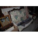 EDWARDIAN MAHOGANY FLORAL UPHOLSTERED TWO SEAT SOFA, TOGETHER WITH A MATCHING TUB CHAIR