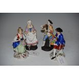 TWO PAIRS OF CONTINENTAL FIGURINES - LADY AND GENTLEMAN WITH FLOWERS, TOGETHER WITH GENTLEMAN