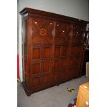 EARLY 20TH CENTURY OAK THREE DOOR WARDROBE