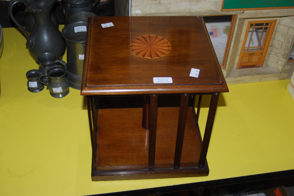 MAHOGANY SQUARE REVOLVING BOOK STAND WITH CIRCULAR INLAID DETAIL