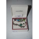 WHITE METAL PANDORA BRACELET WITH COLOURED BEADS