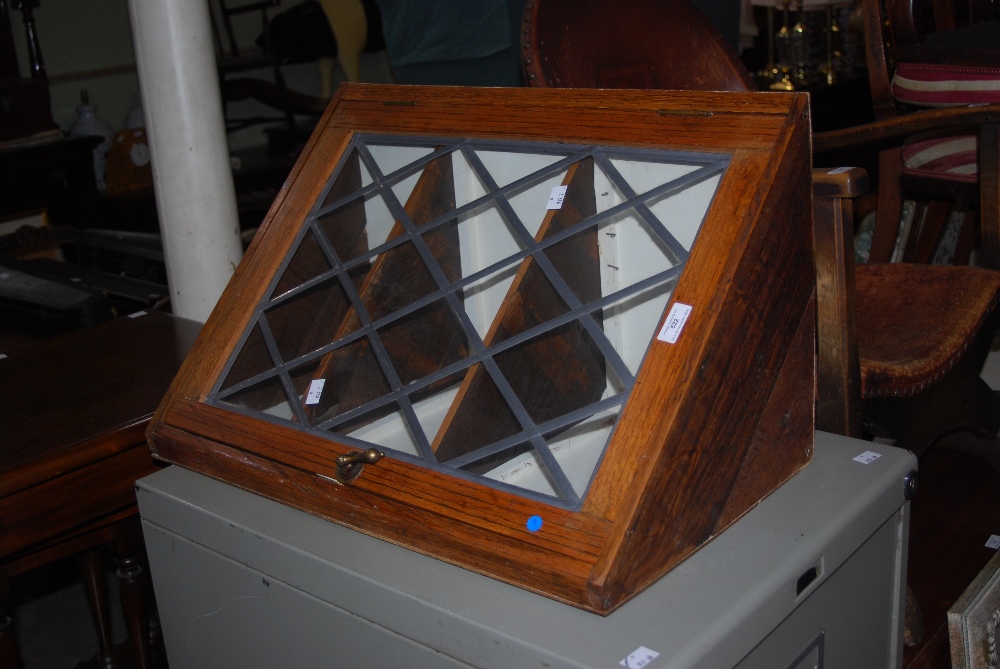 OAK AND LEADED GLASS HANGING CORNER CABINET