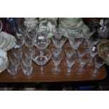 ASSORTED STEMMED GLASSWARE INCLUDING FERN ETCHED WINE GLASSES, WHISKY TUMBLERS, SUNDAE DISHES,