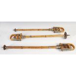 Three assorted Edwardian Country House bamboo and white metal mounted shooting sticks, one with