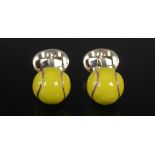 DEAKIN & FRANCIS, A pair of novelty silver cufflinks, each formed as a yellow enamel tennis ball,