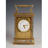 A late 19th century French brass and champleve enamel repeating carriage clock, retailed by Hamilton