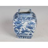 A Chinese porcelain blue and white square shaped vase in the Ming style, decorated with continuous