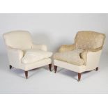 A pair of late 19th/early 20th century mahogany armchairs by Howard & Sons, the upholstered backs