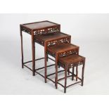 A quartetto of four Chinese dark wood occasional tables, late 19th/early 20th century, the