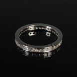 ANTWERP DIAMONDS, A platinum and diamond set full eternity ring, with thirty Princess cut diamonds,